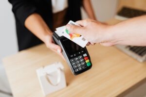 A business accepting a credit card transaction